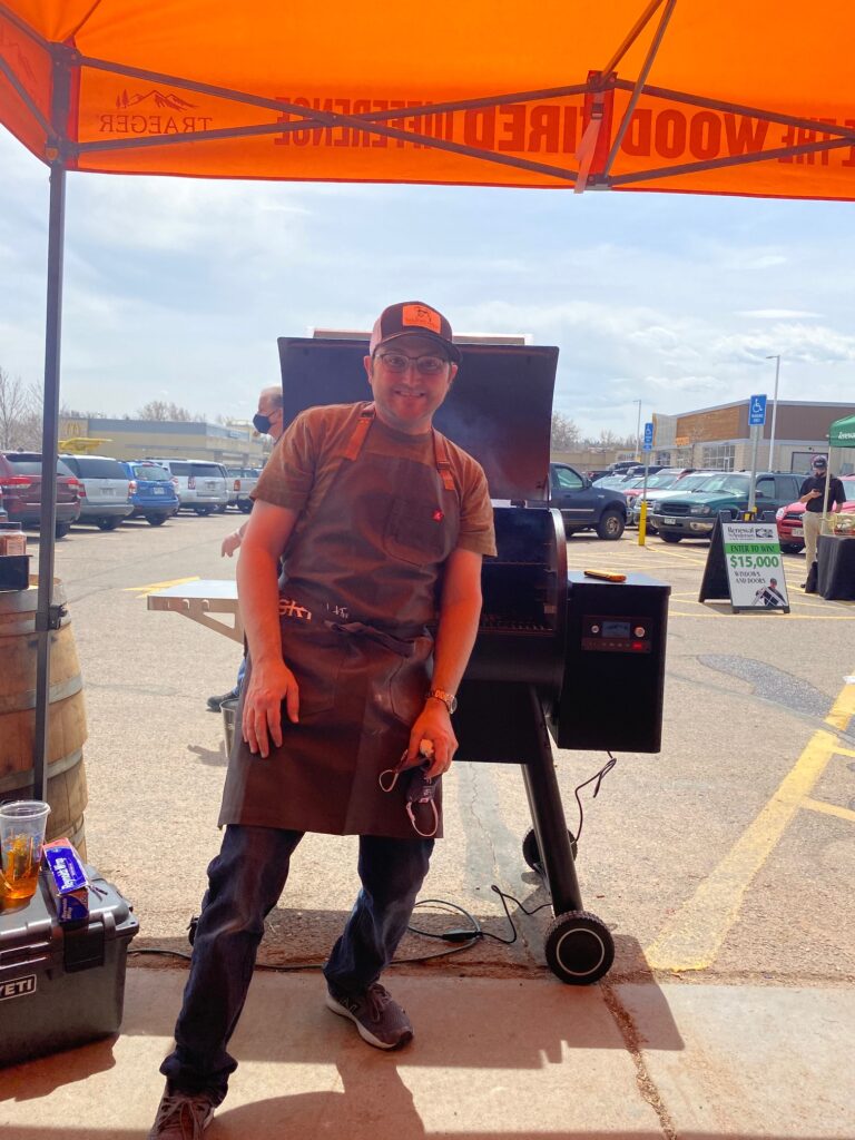 Adam in front of a Traeger