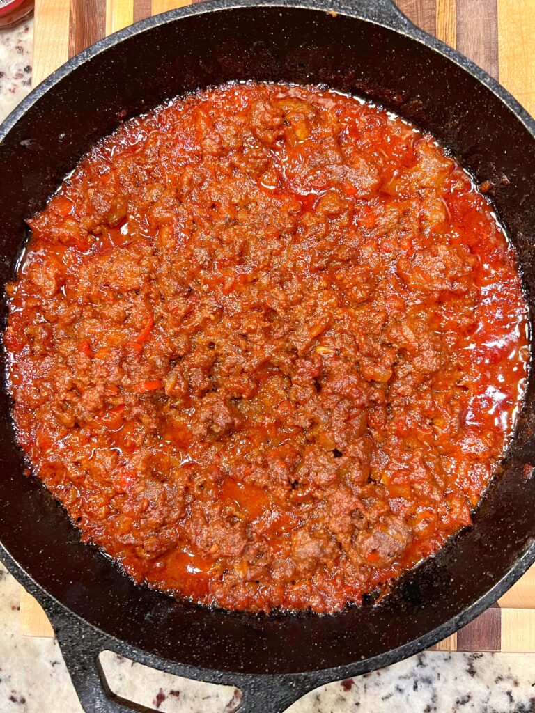 Sauced meat in the pan