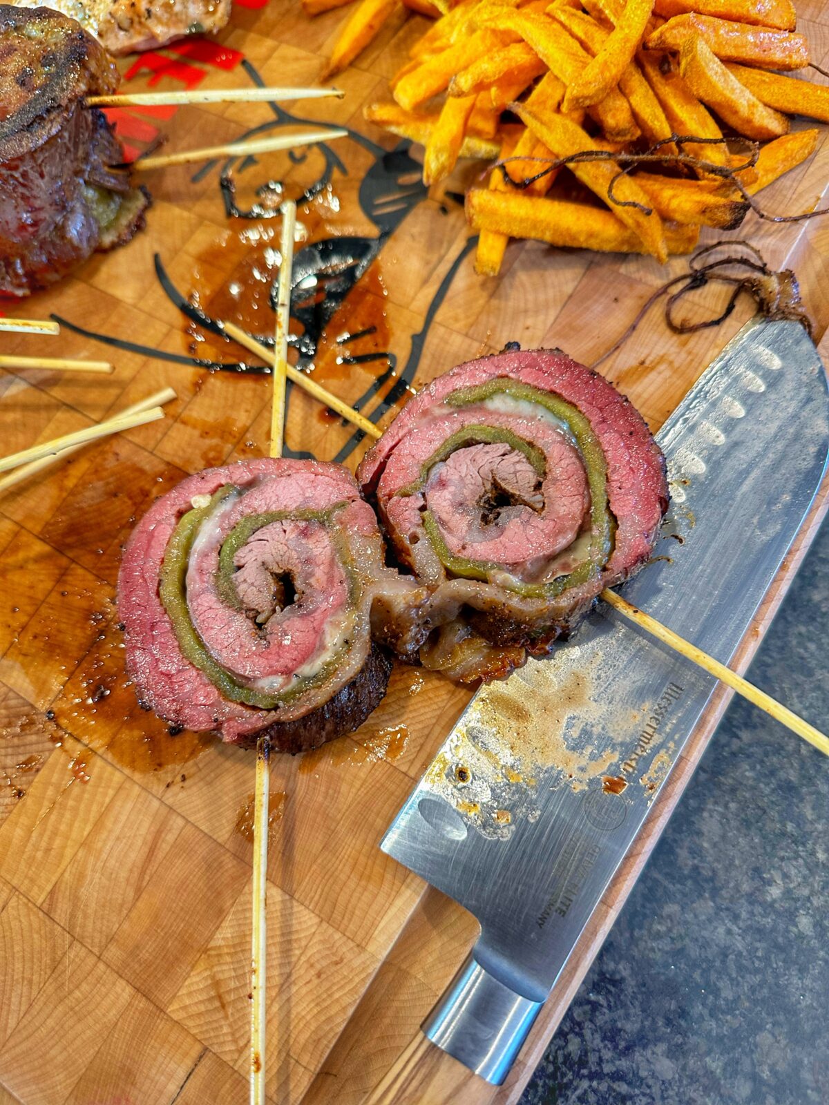 Sliced flank steak pinwheels.