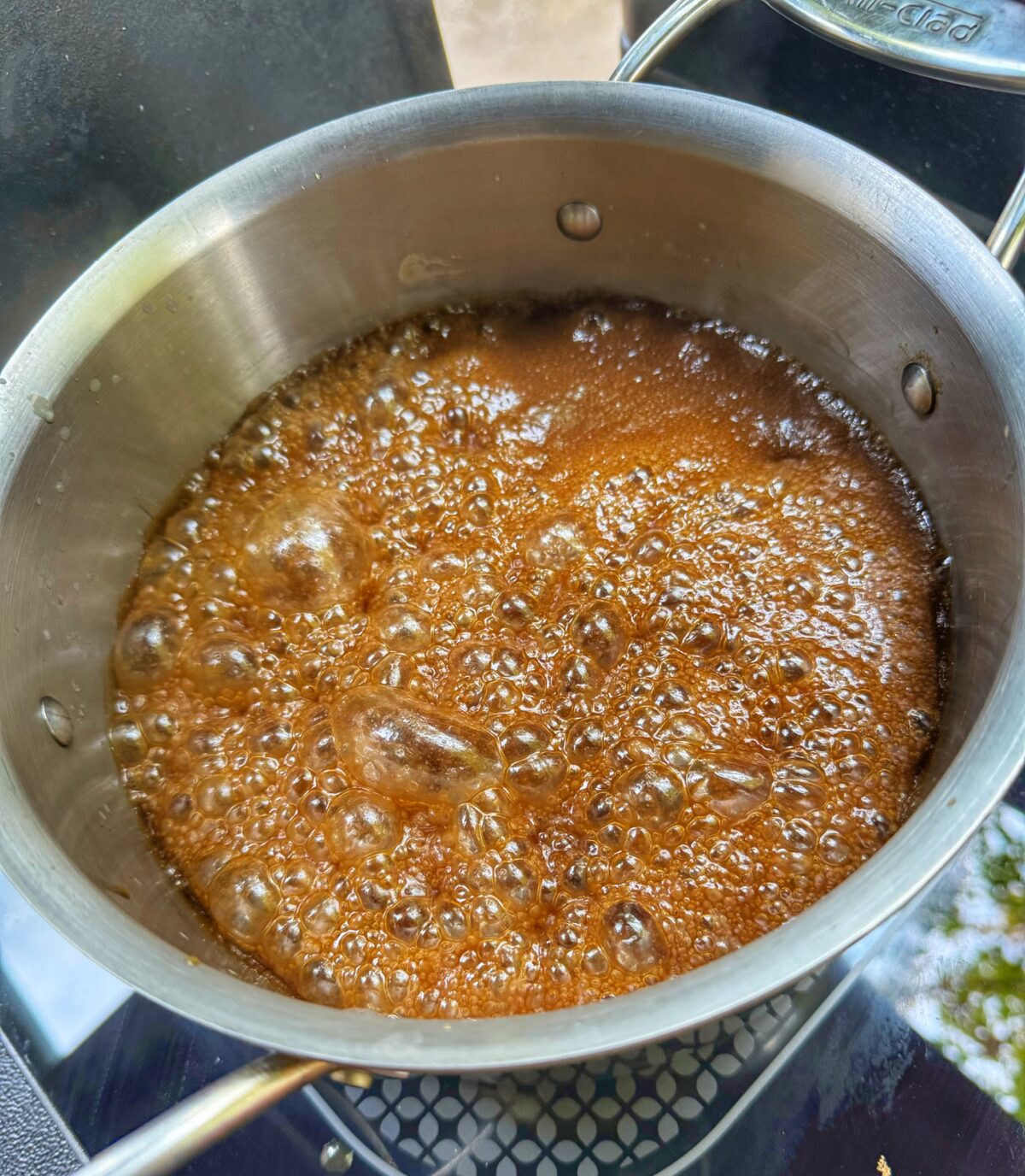 A pot of caramel bubbling.
