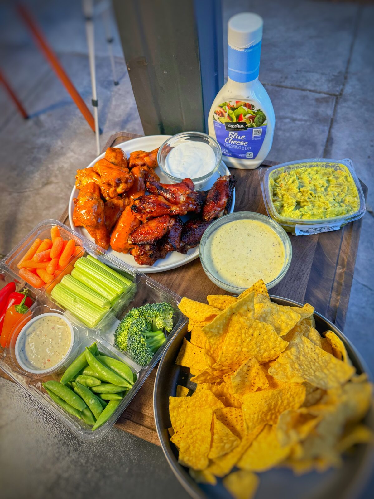 Wings, veggies, guac and queso all ready for the big game.