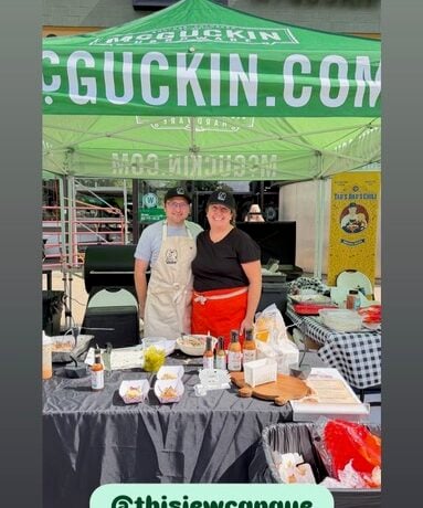 ThisJewCanQue team standing behind the outdoor grilling demo table at McGuckin Hardware in Boulder, Colorado.